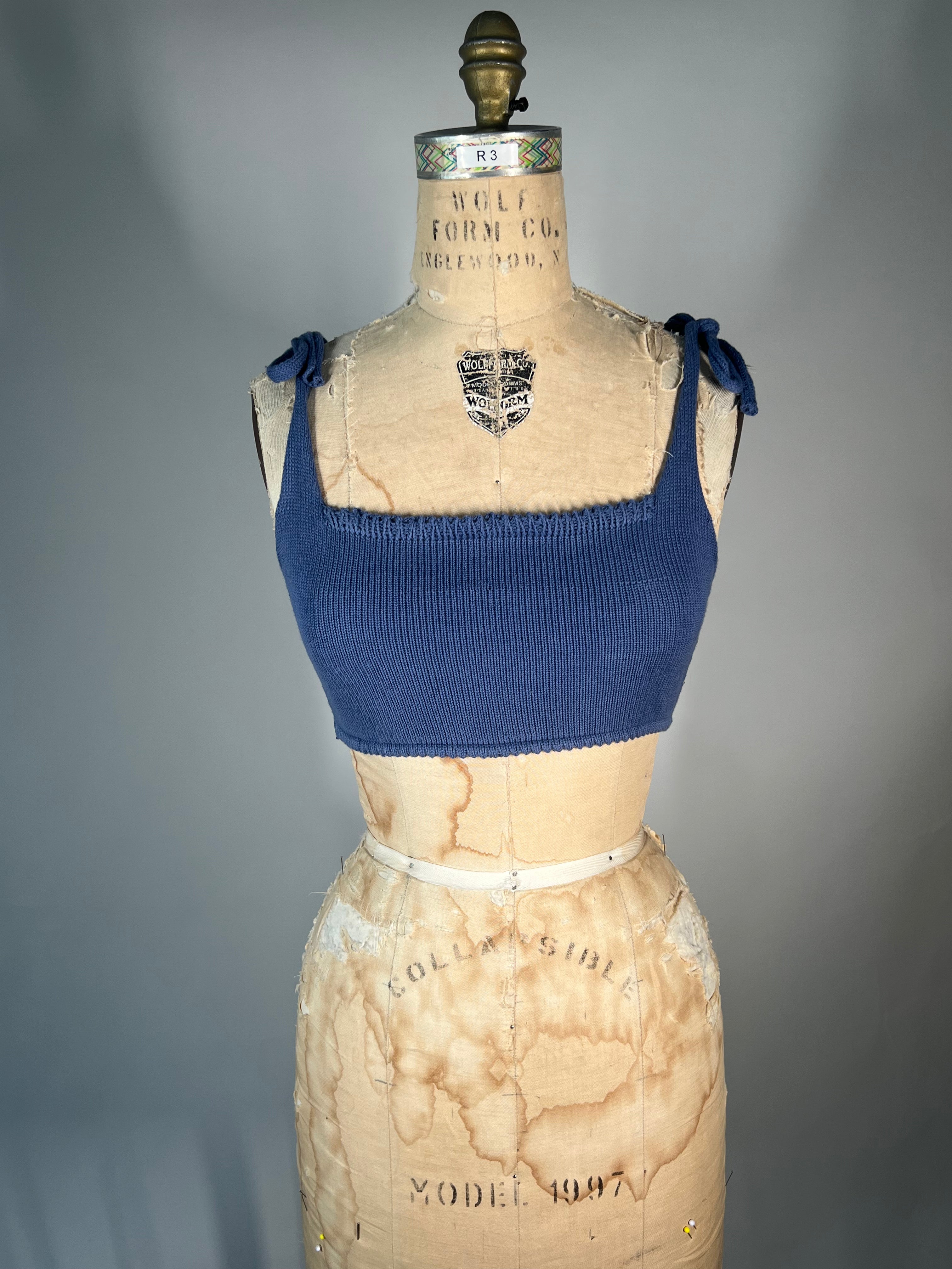 Reversible shoulder tie bra top